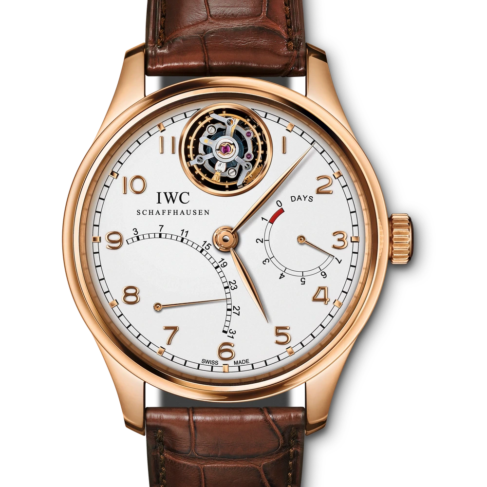 IWC Portugieser Tourbillon Mystère Rétrograde, 18 ct 5N gold, silver dial